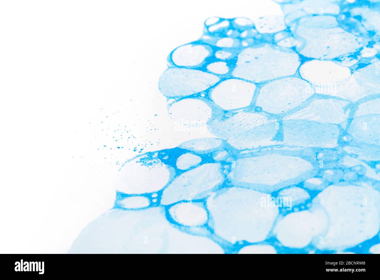 Light blue bubbles splash background ink reflected on paper texture