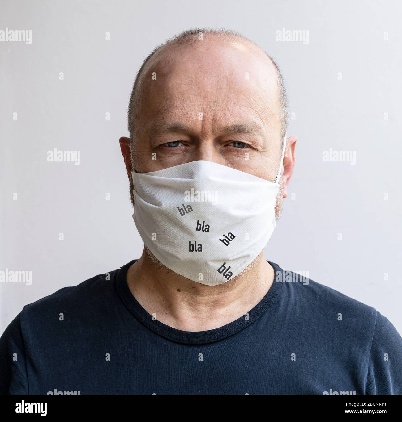 Have a conversation with the protective mask in front of your mouth during the coronavirus period Stock Photo