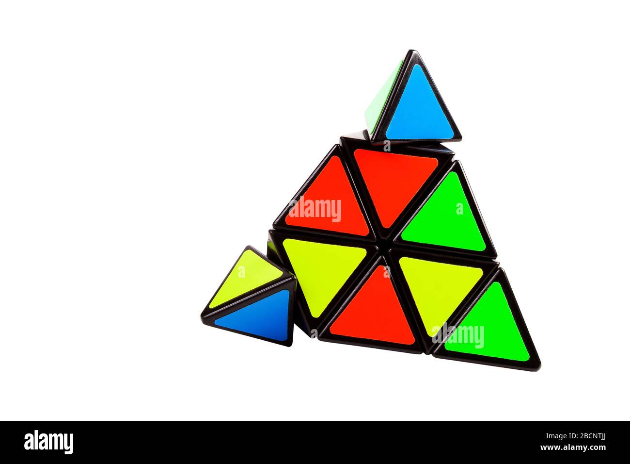 Triangular pyramid toy, complex logical puzzle with moving elements, parts isolated on white. Brain teaser, problem solving, intelligence, intellect Stock Photo