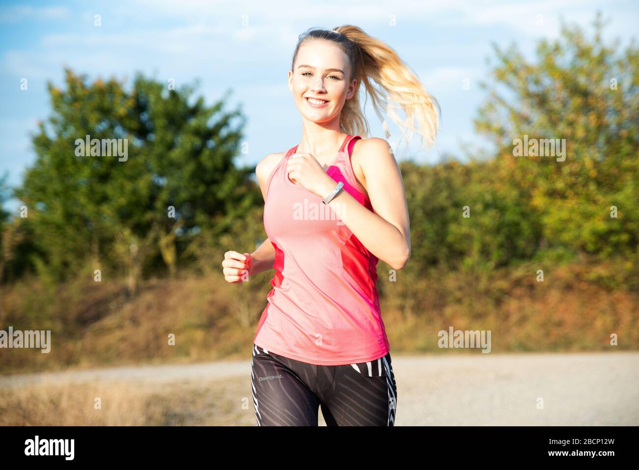 Beautiful young slim blonde woman hi-res stock photography and images ...
