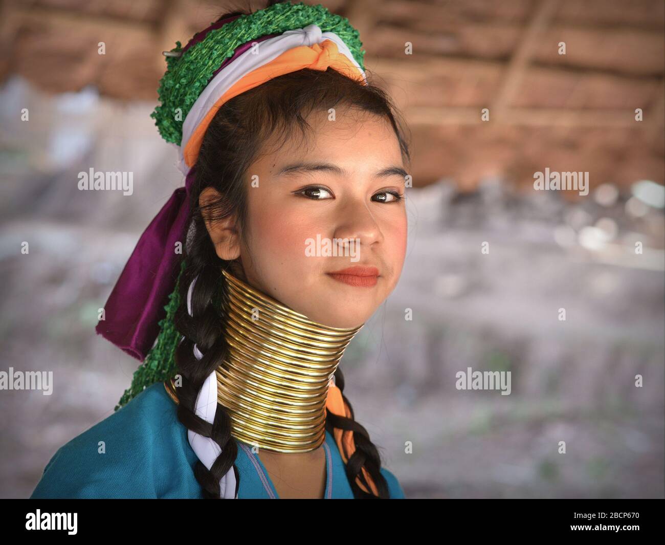 Pretty Thai/Burmese longneck Kayan teenage girl (“giraffe woman”) with