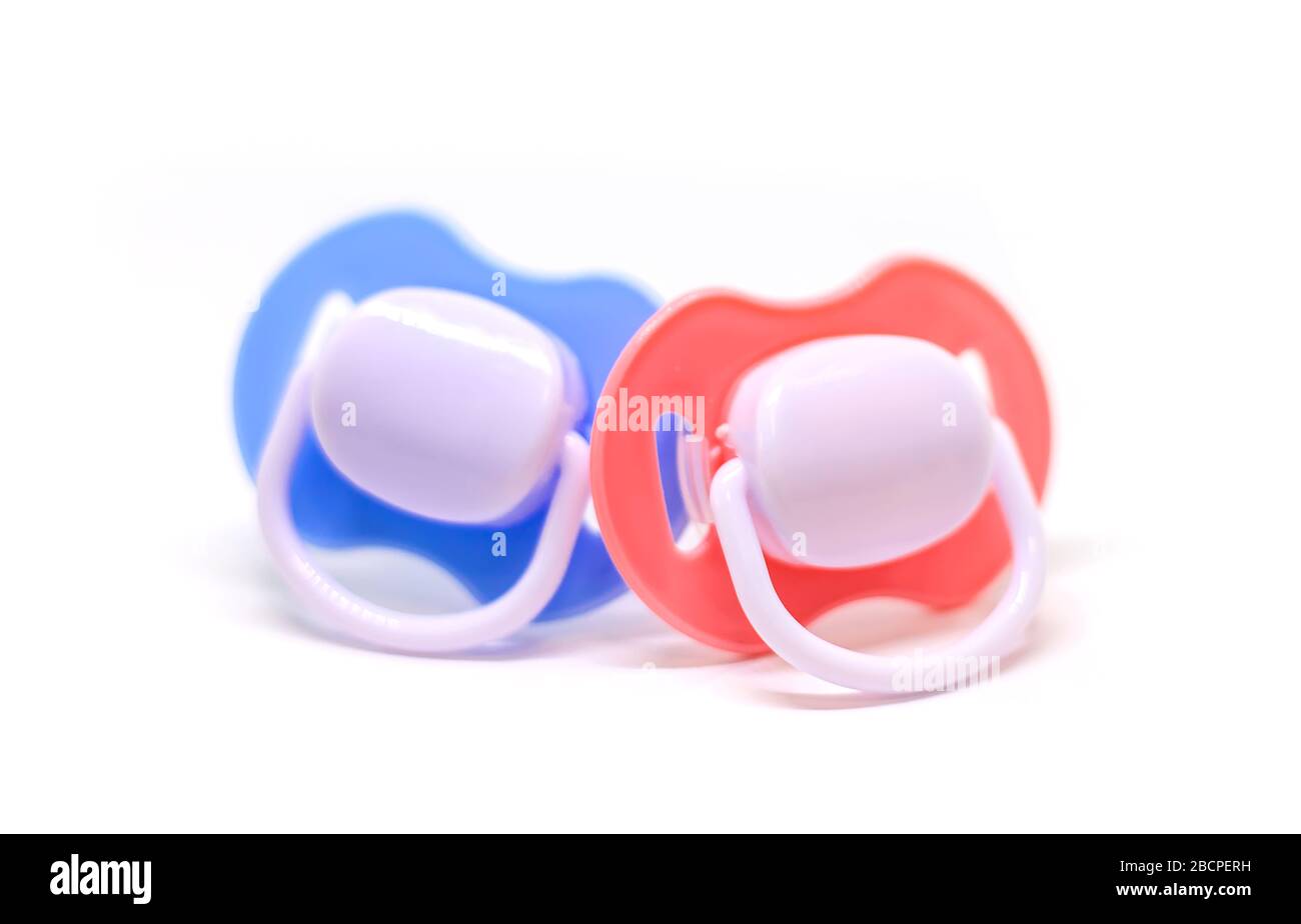 Dummy pacifiers for newborns in different colors. Selective focus. baby