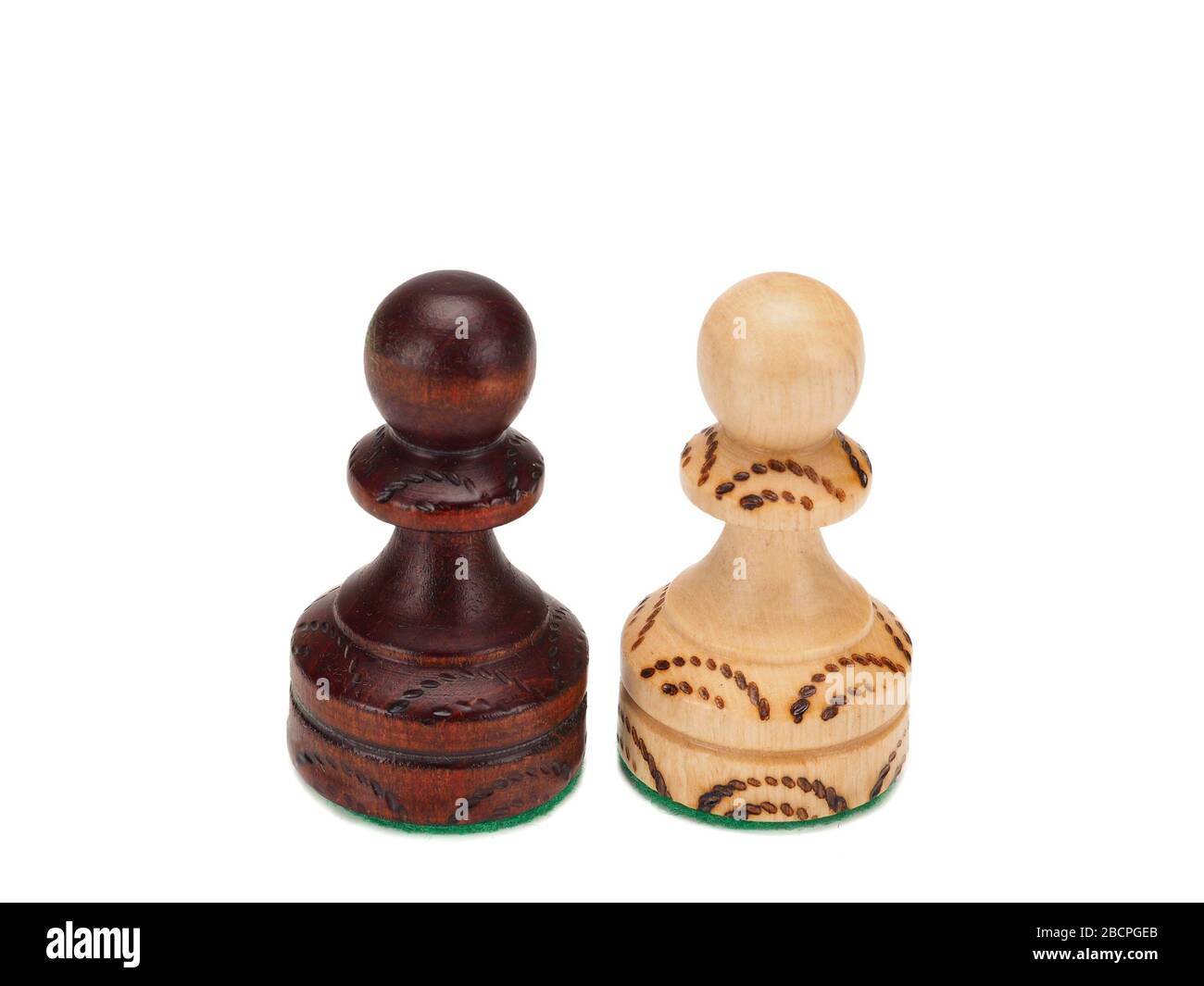 Two chess pawns on a white background Stock Photo