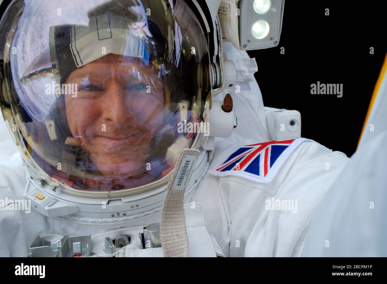 ISS - 15 January 2016 - British ESA astronaut Tim Peake outside the International Space Station in his spacesuit during a spacewalk - the first ever o Stock Photo