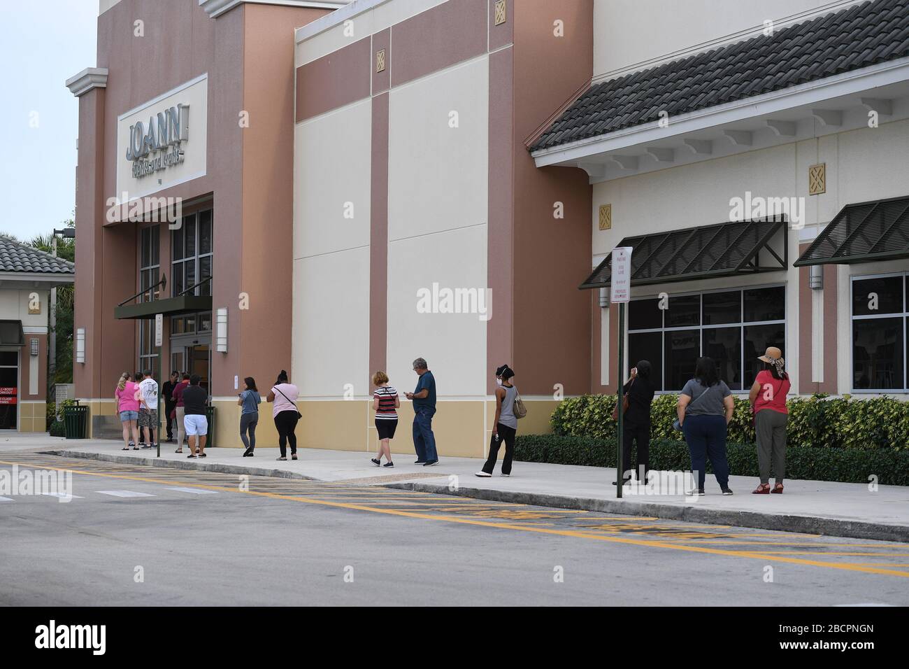 COCONUT CREEK, FL - APRIL 04: Shoppers line up outside Joann Fabrics and Crafts to get material to make masks due to the Coronavirus (COVID-19) pandemic on April 4, 2020 in Coconut Creek, Florida. Credit: mpi04/MediaPunch Stock Photo