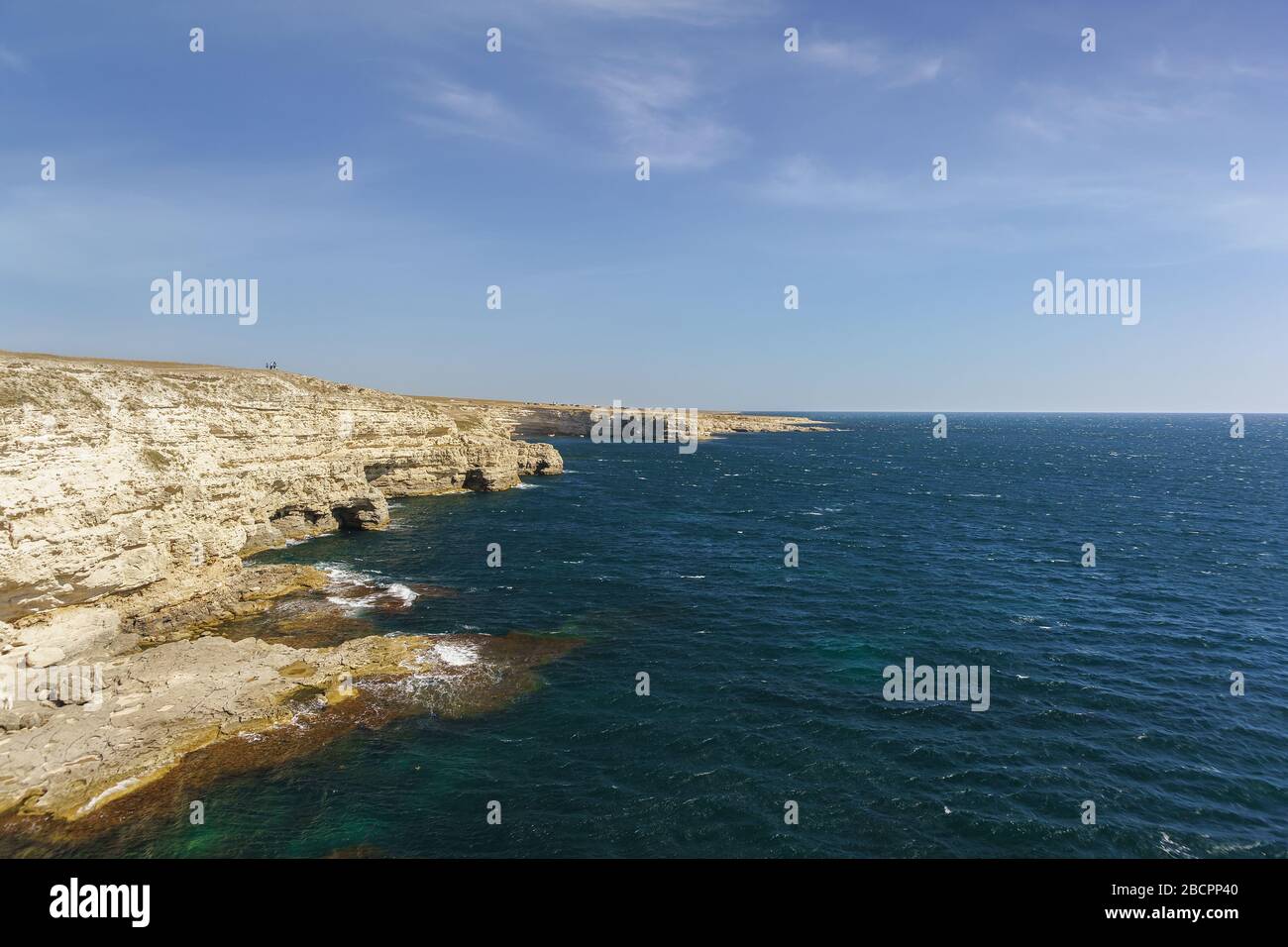 Laconic nature of the Western Crimea. The steep Bank of Cape Tarhankut. Calm blue sea Stock Photo