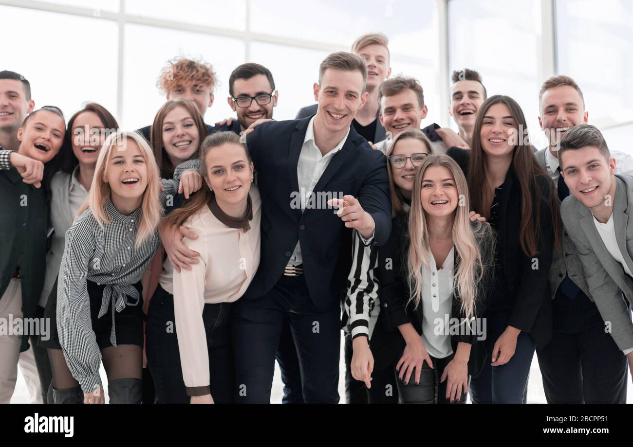 group of cheerful young professionals looking at the camera Stock Photo ...
