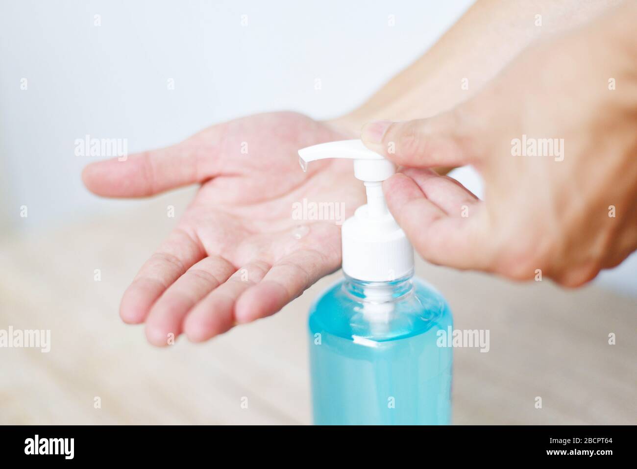 Women washing hands with alcohol gel or antibacterial soap sanitizer ...