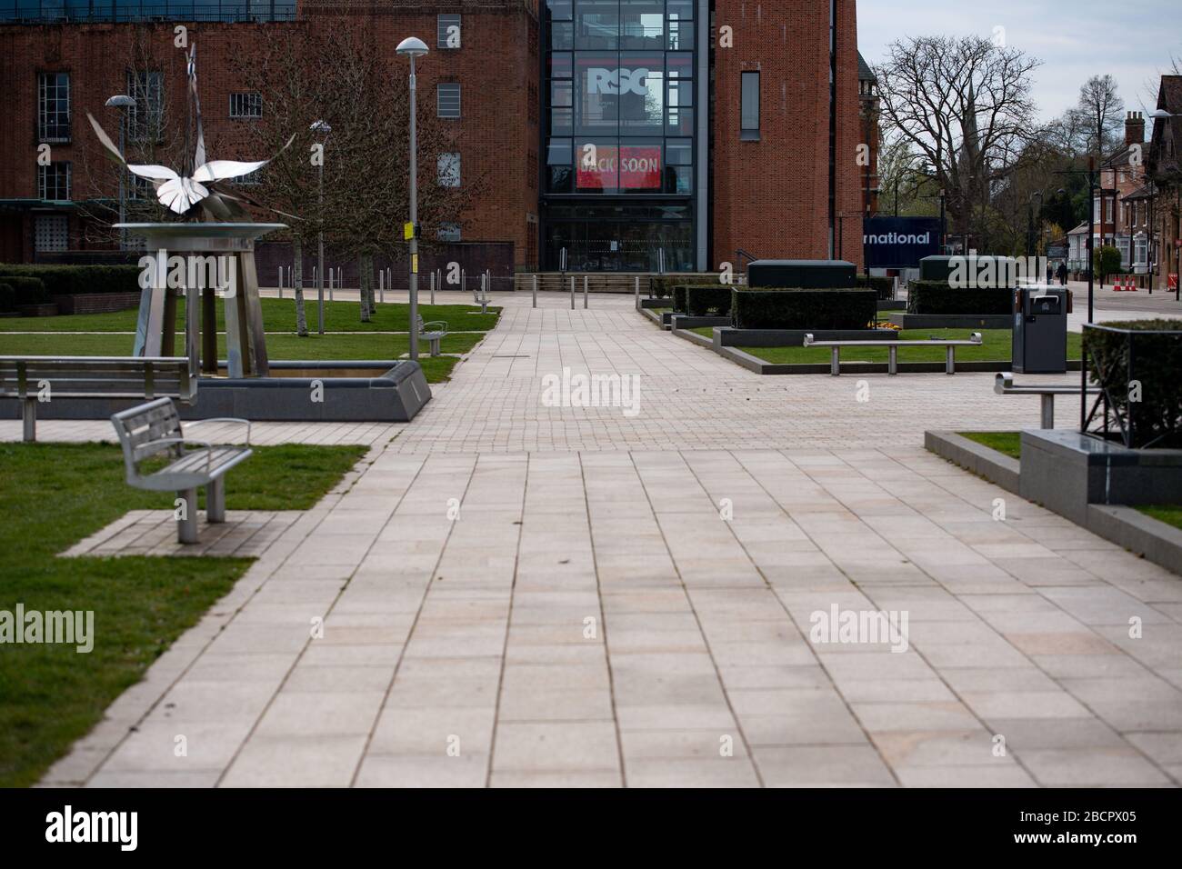 A near-deserted Bancroft Gardens as the Royal Shakespeare Theatre displays a 'Back Soon' message, in Stratford-upon-Avon in Warwickshire, as the UK continues in lockdown to help curb the spread of the coronavirus. Stock Photo