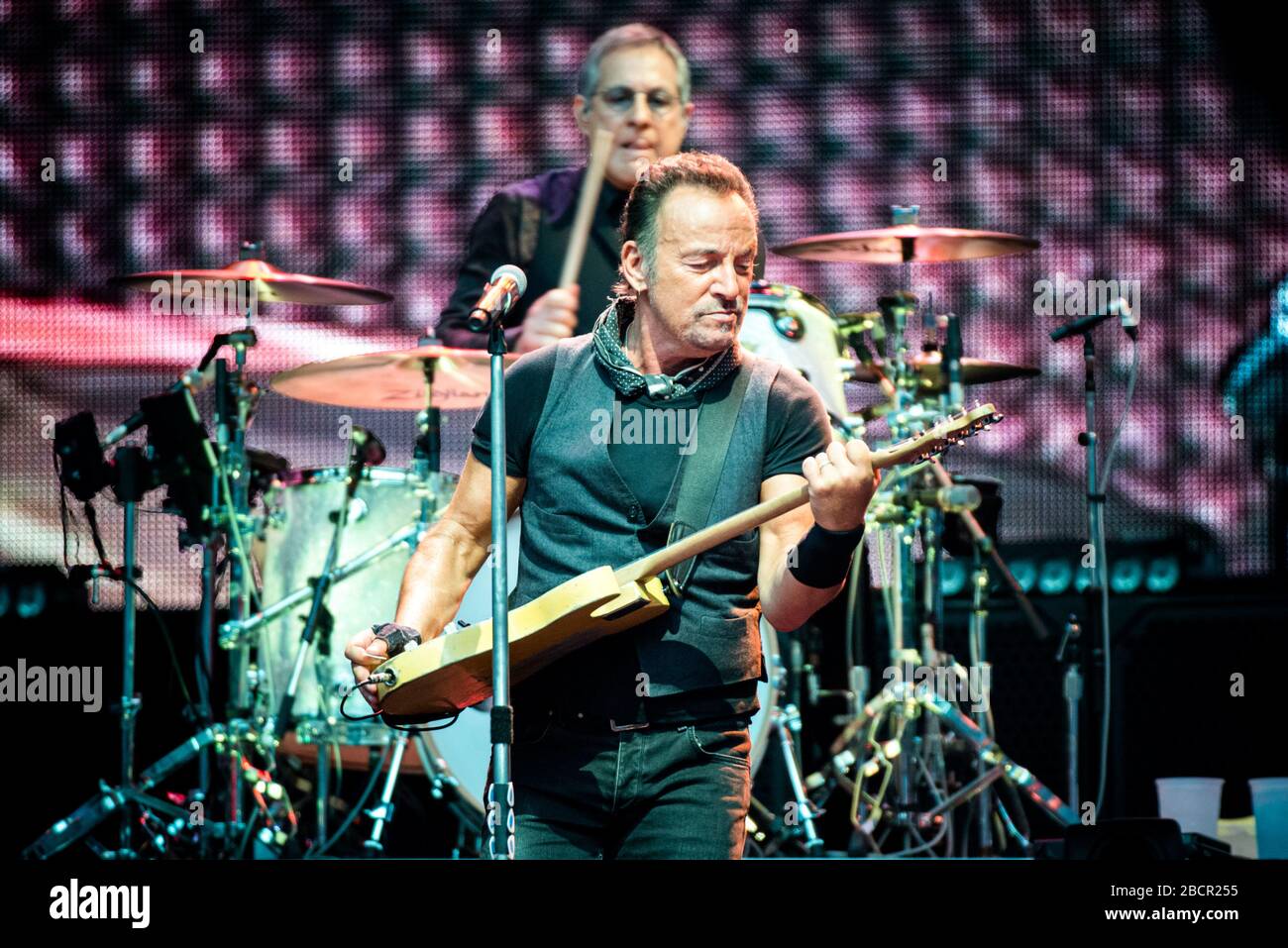 The American singer and composer Bruce Springsteen, together with the E-Street band, playing for the “The River tour” at the San Siro Stadium in Milan Stock Photo