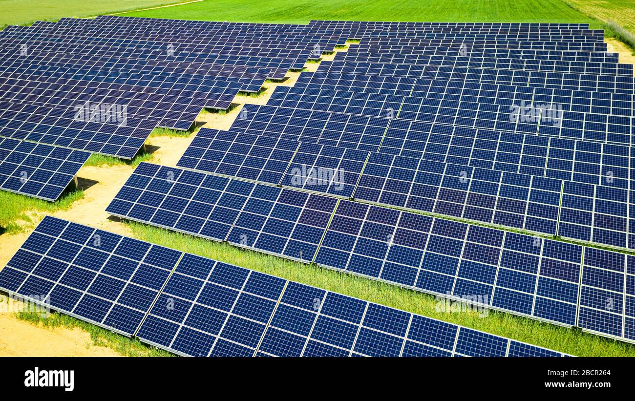 Solar panels with wind turbines hi-res stock photography and images - Alamy