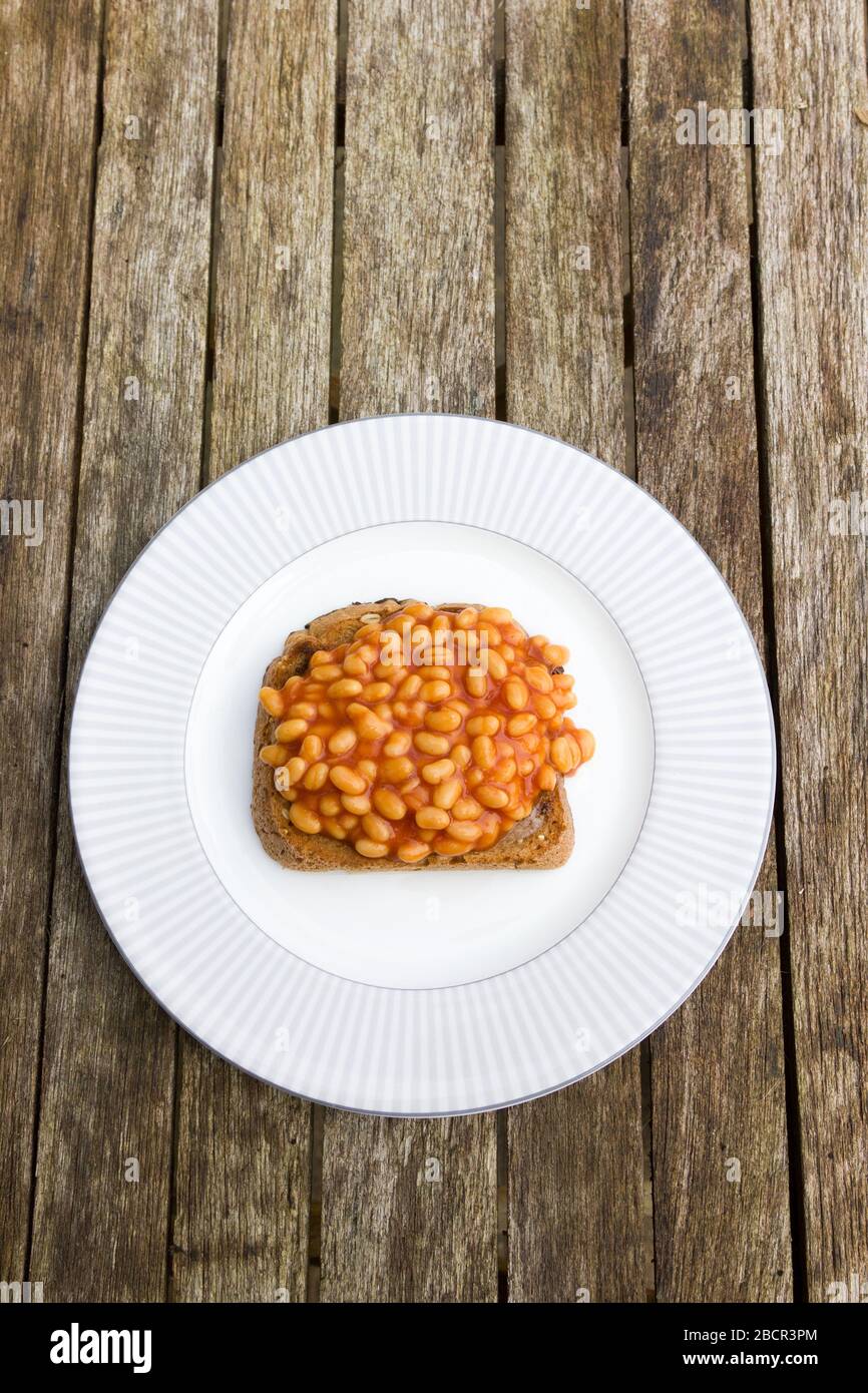 Baked beans on toast Stock Photo