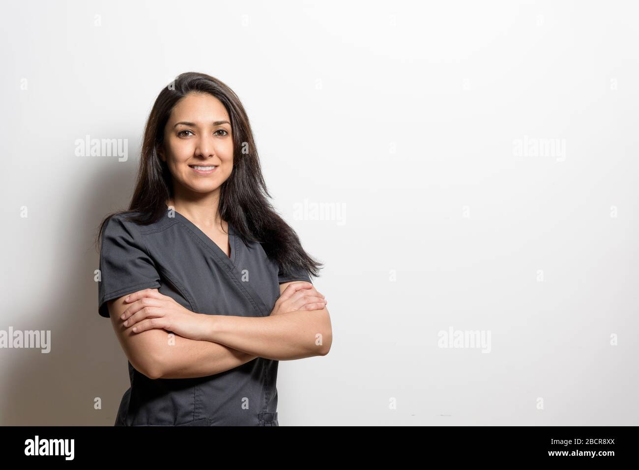 Portrait of a health professional, dentist, doctor, nurse, assistant, isolated from a white