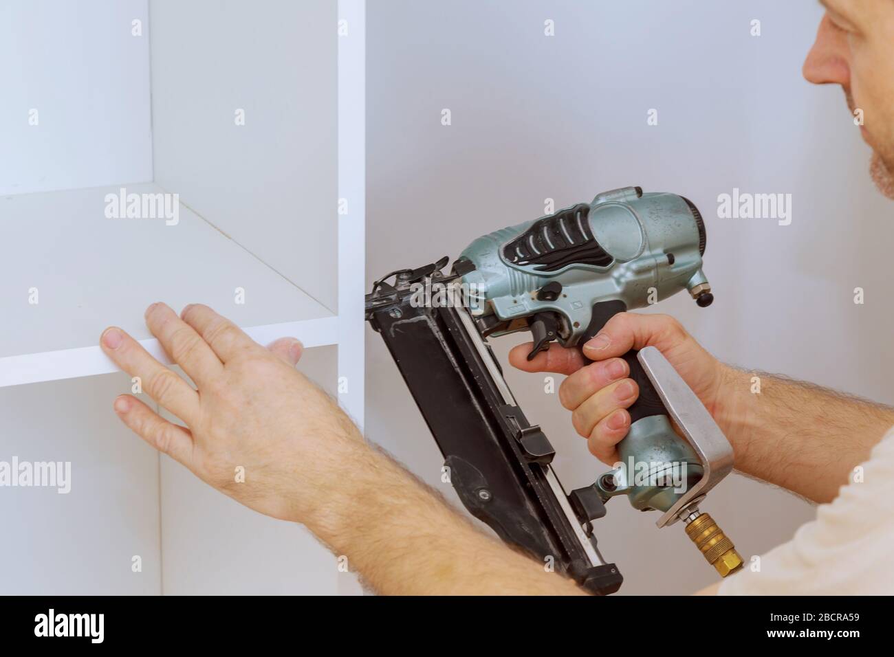 Assembling shelves for closet with home a new apartment wall