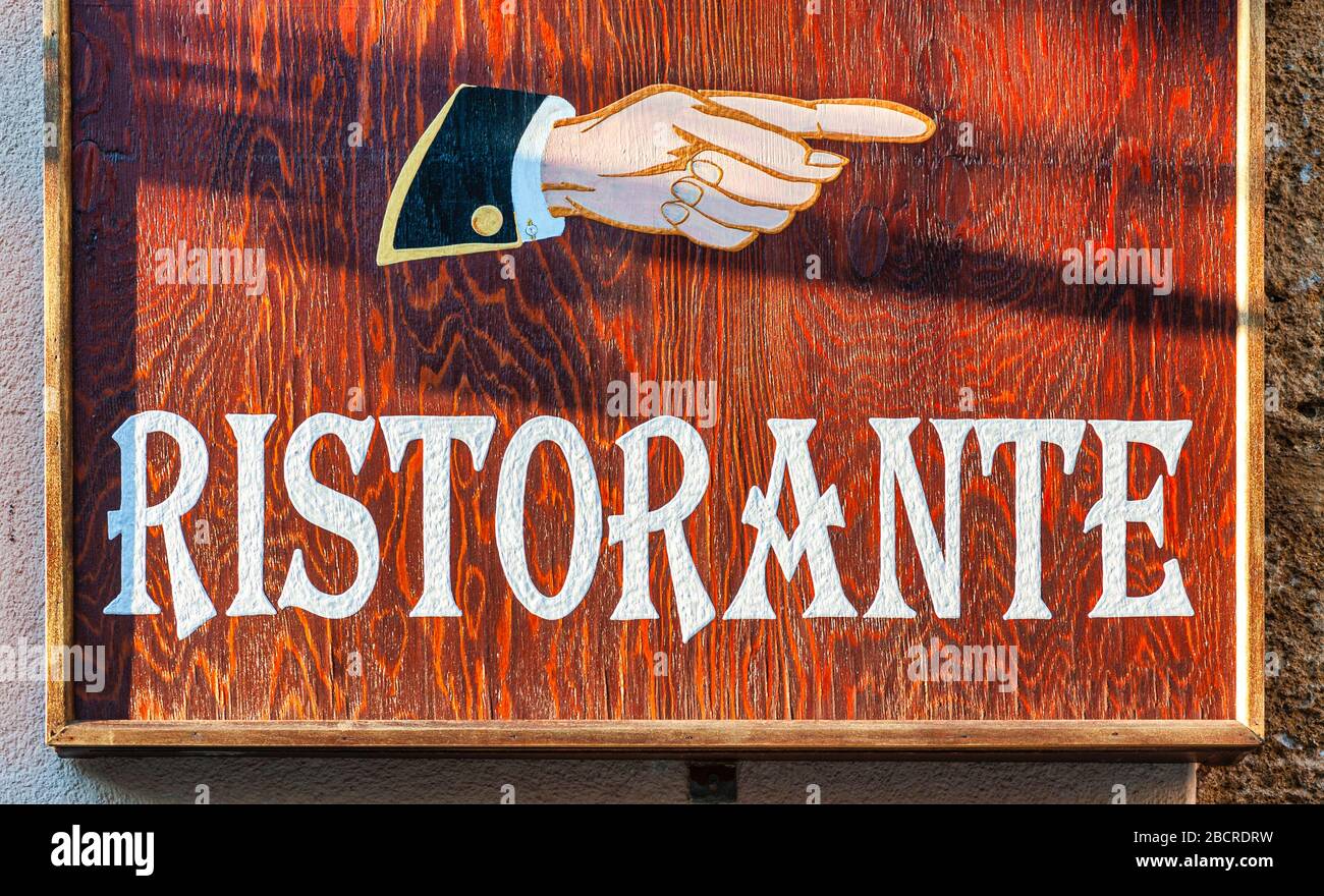 Handmade sign pointing to a Ristorante Stock Photo