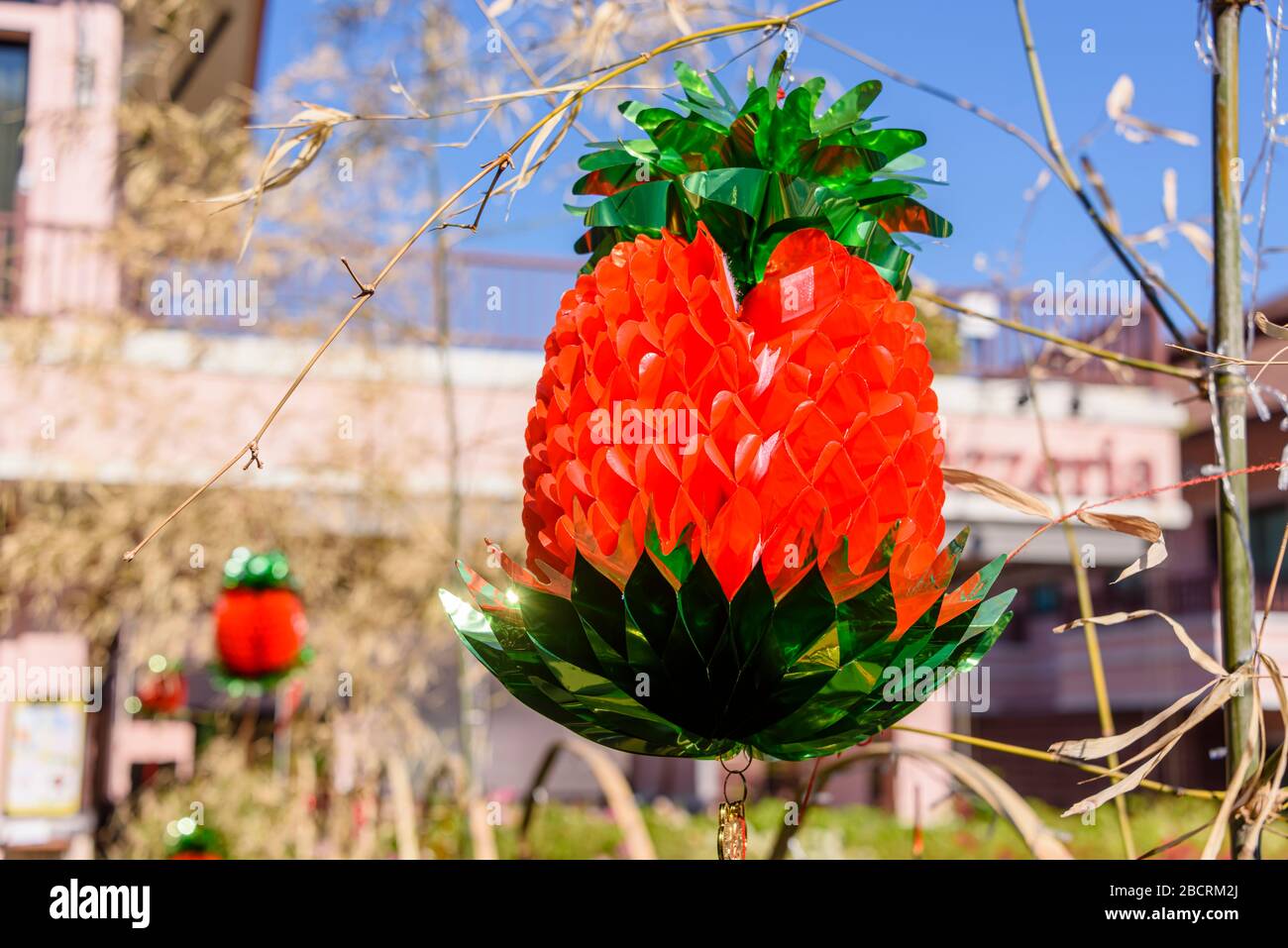 Red paper decoration hanging outside for the Chinese lunar new year, Thailand Stock Photo