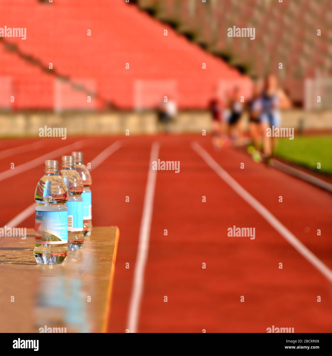 Bottle of water on athletics race, drinking, running, refreshment Stock Photo