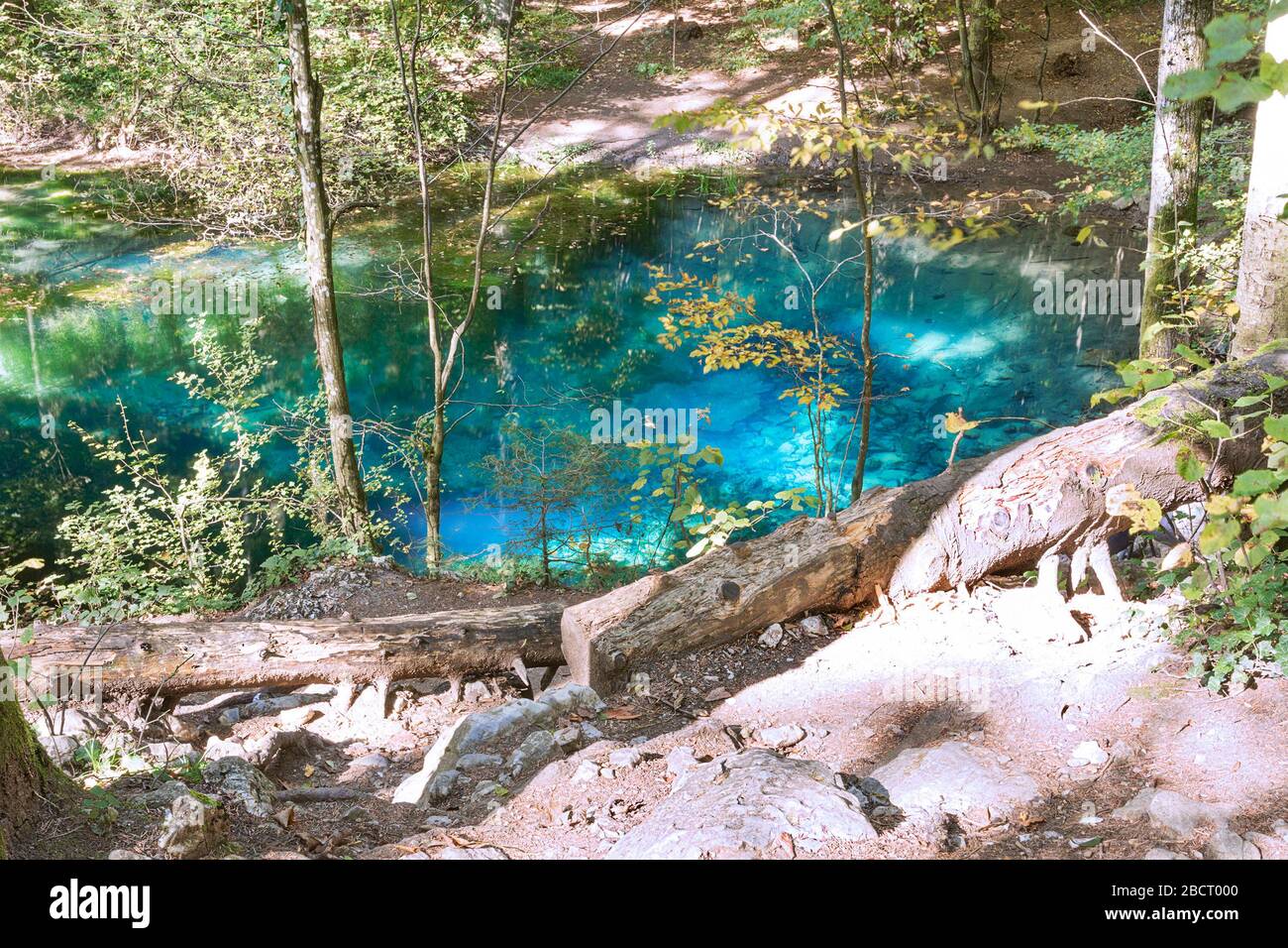 natural blue coloured wellspring lake in Cheile Nerei, Ochiul Bei, Caransebes, Romania Stock Photo