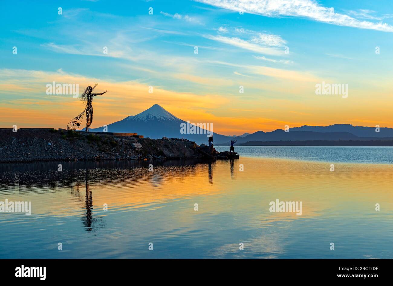 Sunrise along the Llanquihue lake with the Osorno volcano. View from Puerto Varas near Puerto Montt, Chile. Stock Photo
