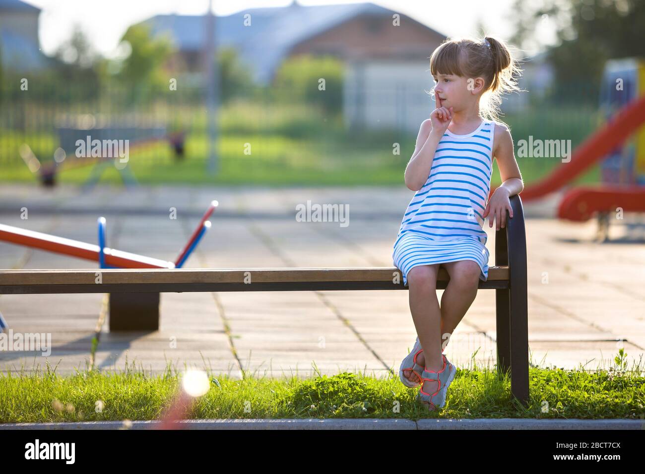 Charming Little Girl in Short Dress. Stock Photo - Image of