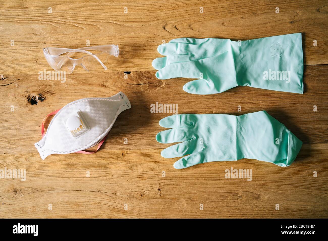 Protective and safety equipment on a wooden background Stock Photo