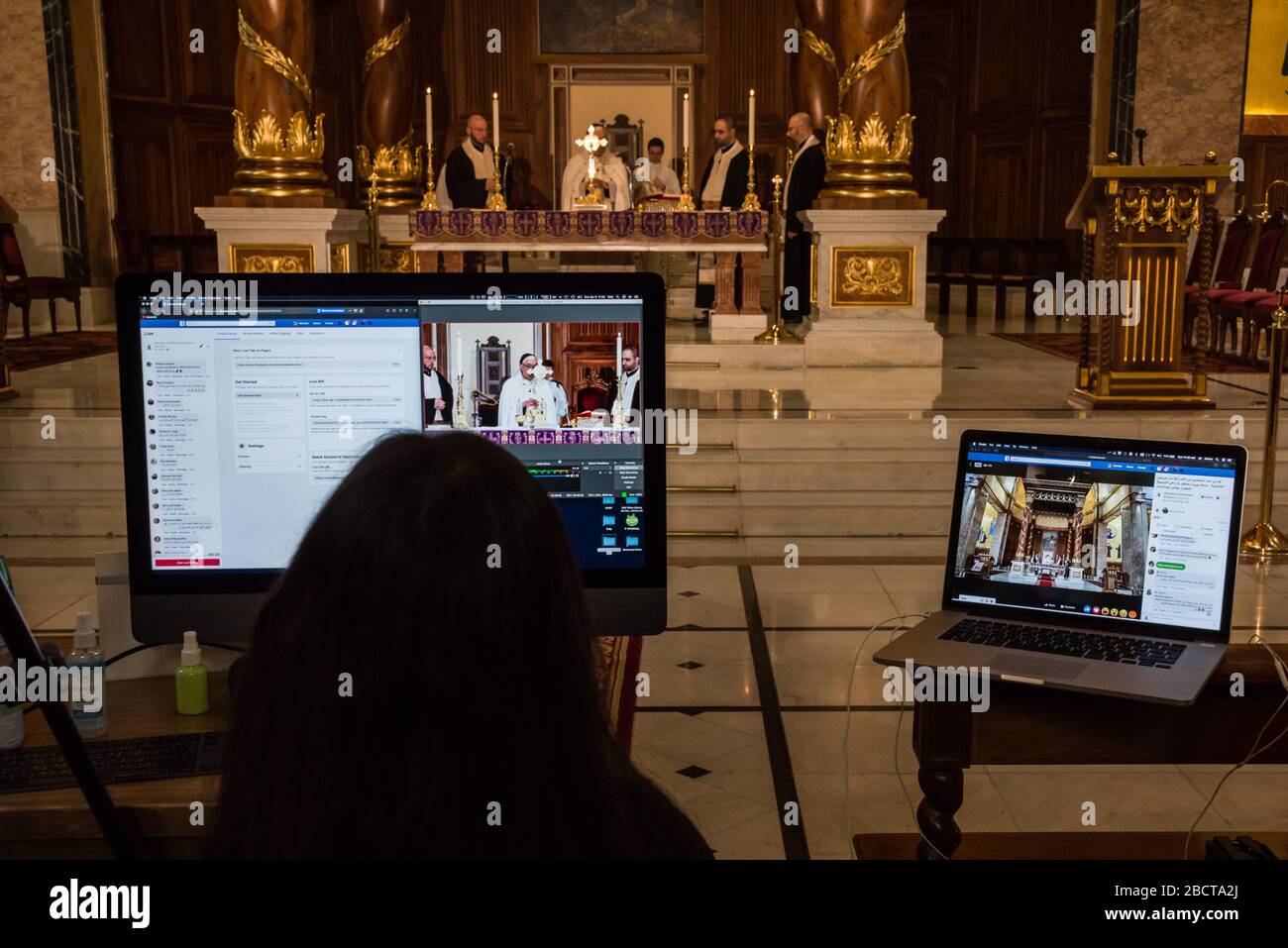 Beirut, Lebanon, 5 April 2020. Live-streaming Palm Sunday mass via Facebook, from an empty St George Maronite Cathedral as people were asked not to attend religious gatherings in an effort to slow the spread of novel coronavirus. Elizabeth Fitt Credit: Elizabeth Fitt/Alamy Live News Stock Photo
