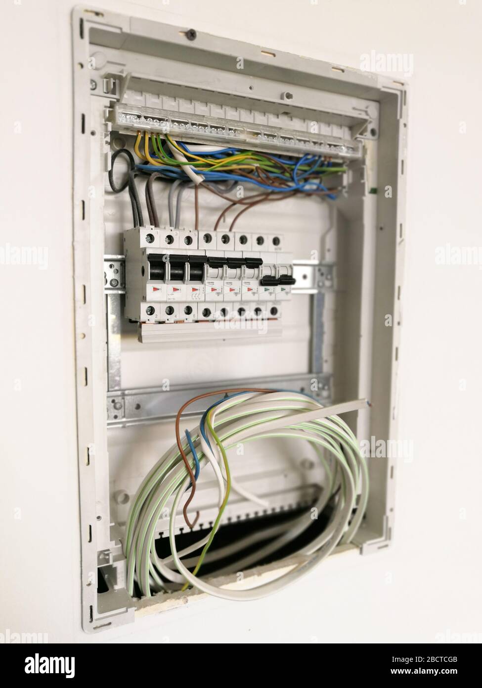 Electric safety switches and wiring inside electrical panel Stock Photo