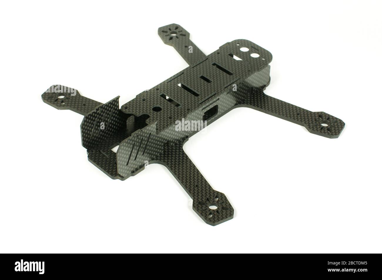 Beginning of racing drone assembly. Durable frame of drone made from carbon fiber Stock Photo