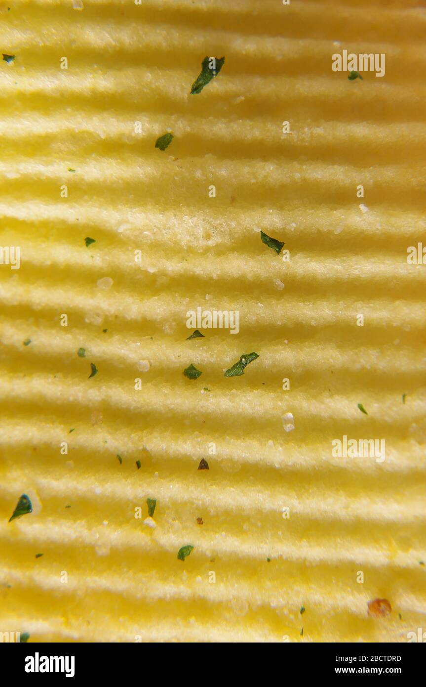 Wavy potato chips abstract texture pattern macro close up Stock Photo