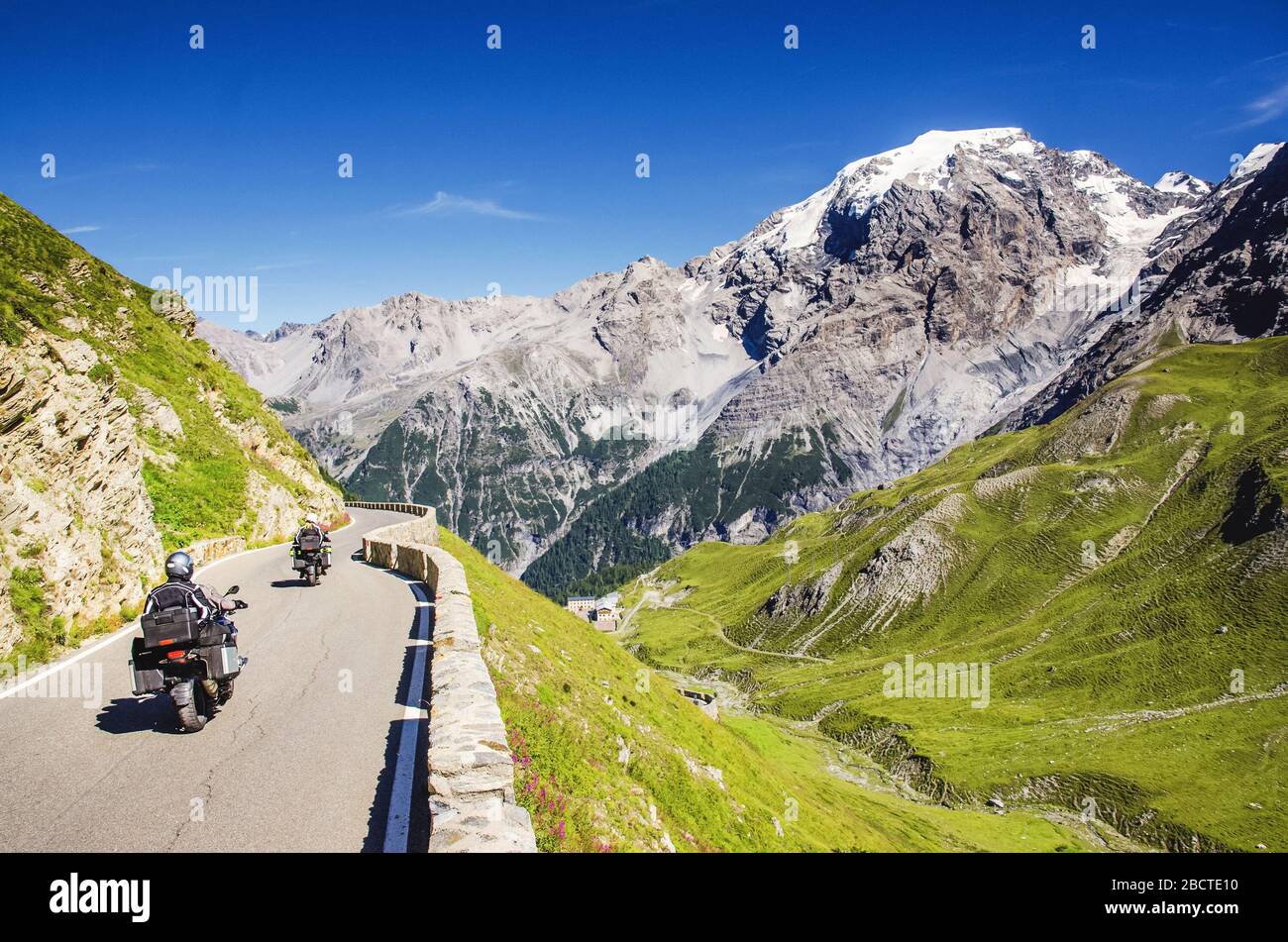 Close view on motorbike on the famous road in mountains Alps Passo Stelvio. Favourite place for all bike riders Stock Photo