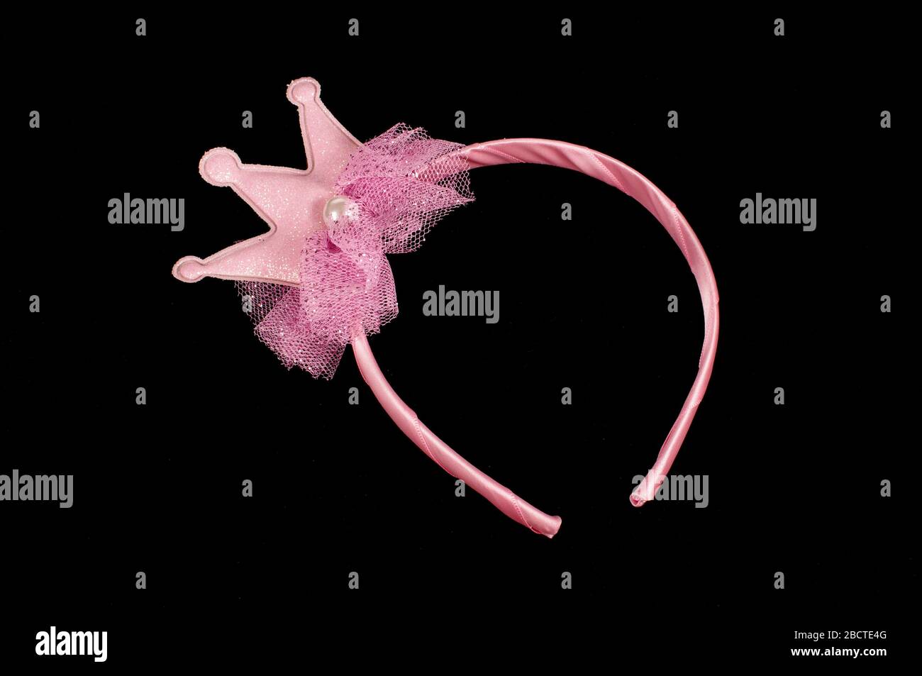Pink princess headband for girls whose like role playing games Stock Photo