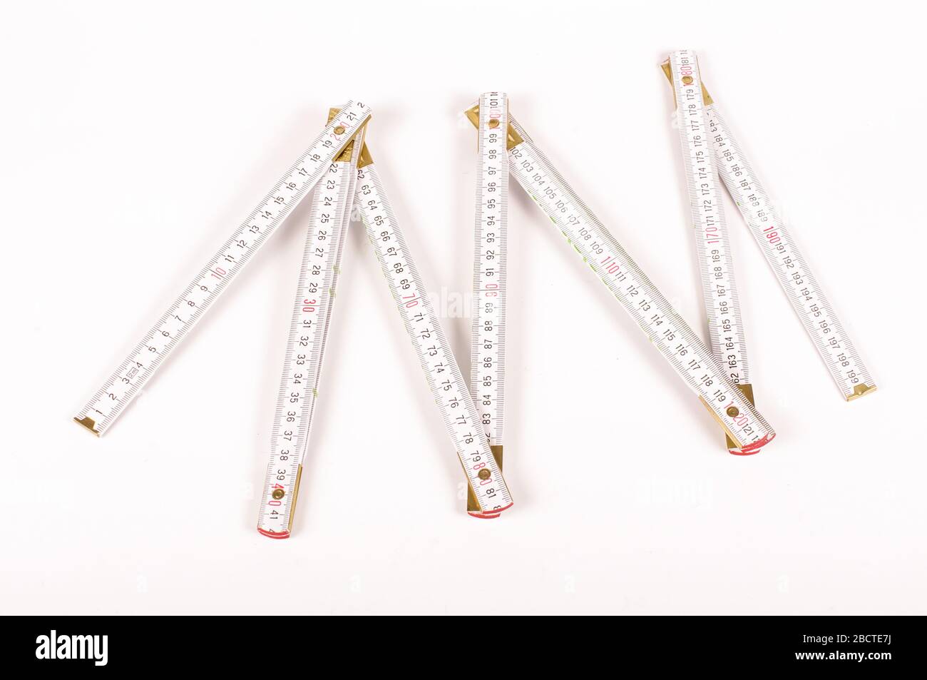 White carpenter's ruler isolated on the white background Stock Photo