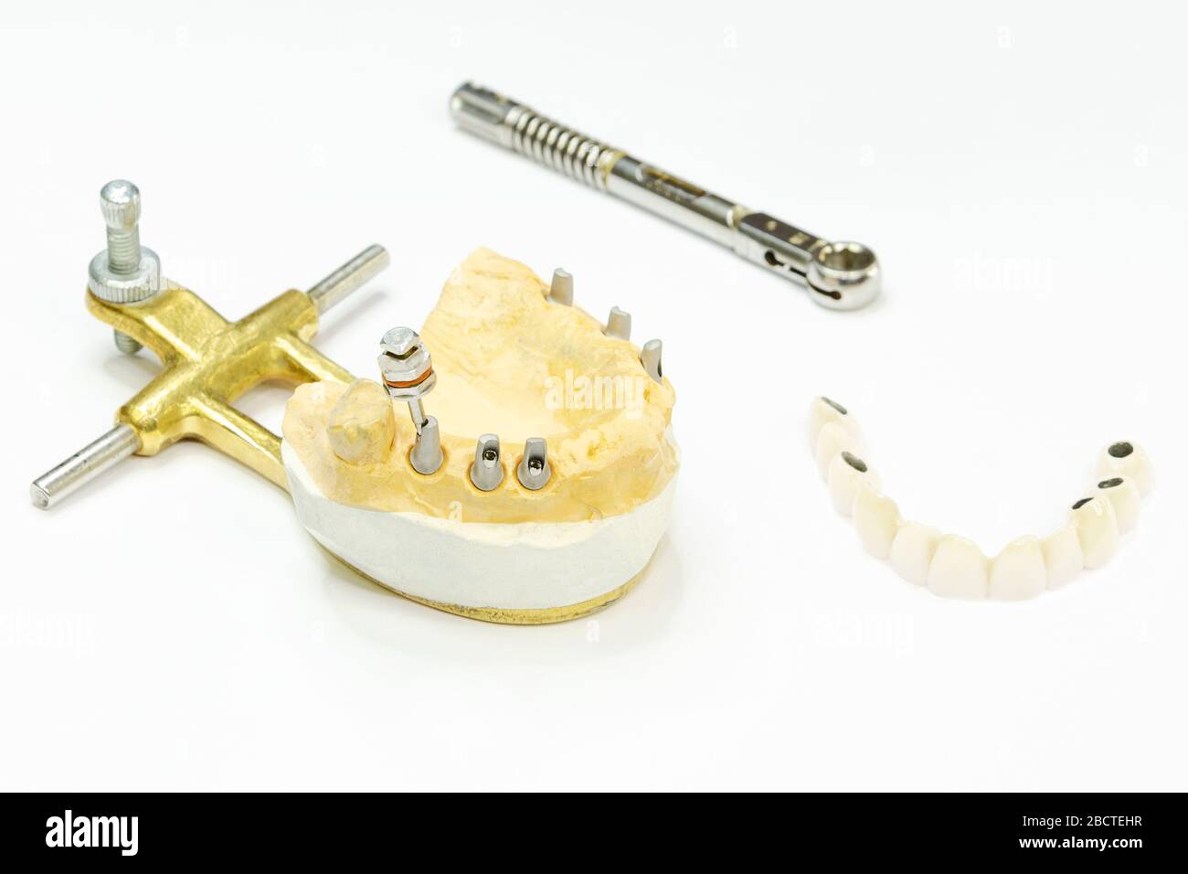the process of manufacturing ceramic teeth on implants. dental implants