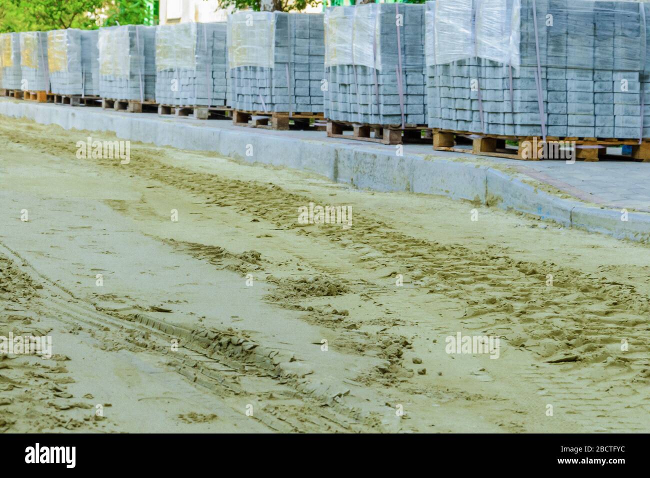 laying paving slabs on sand