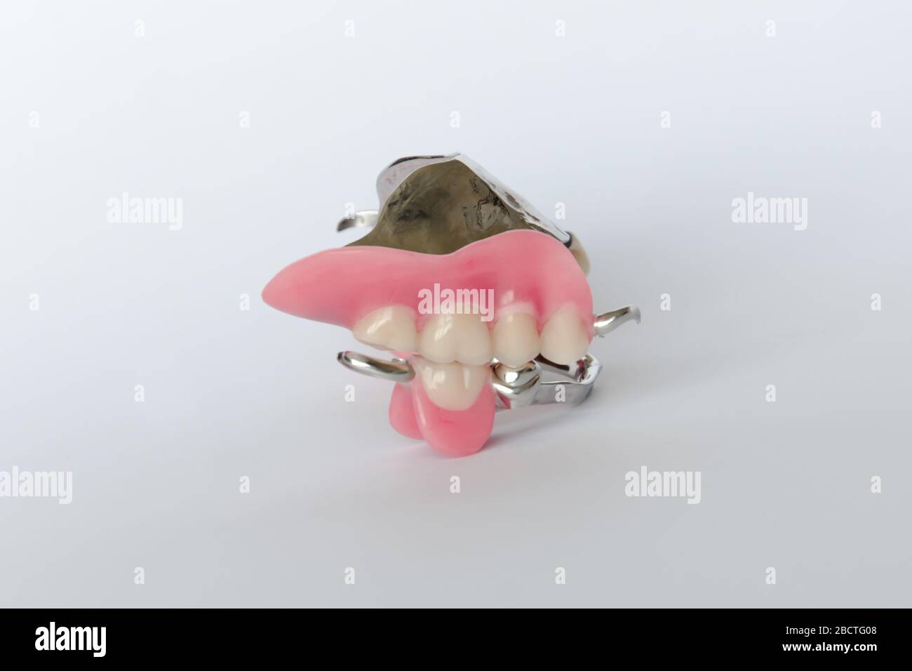false teeth on the upper and lower jaw Stock Photo