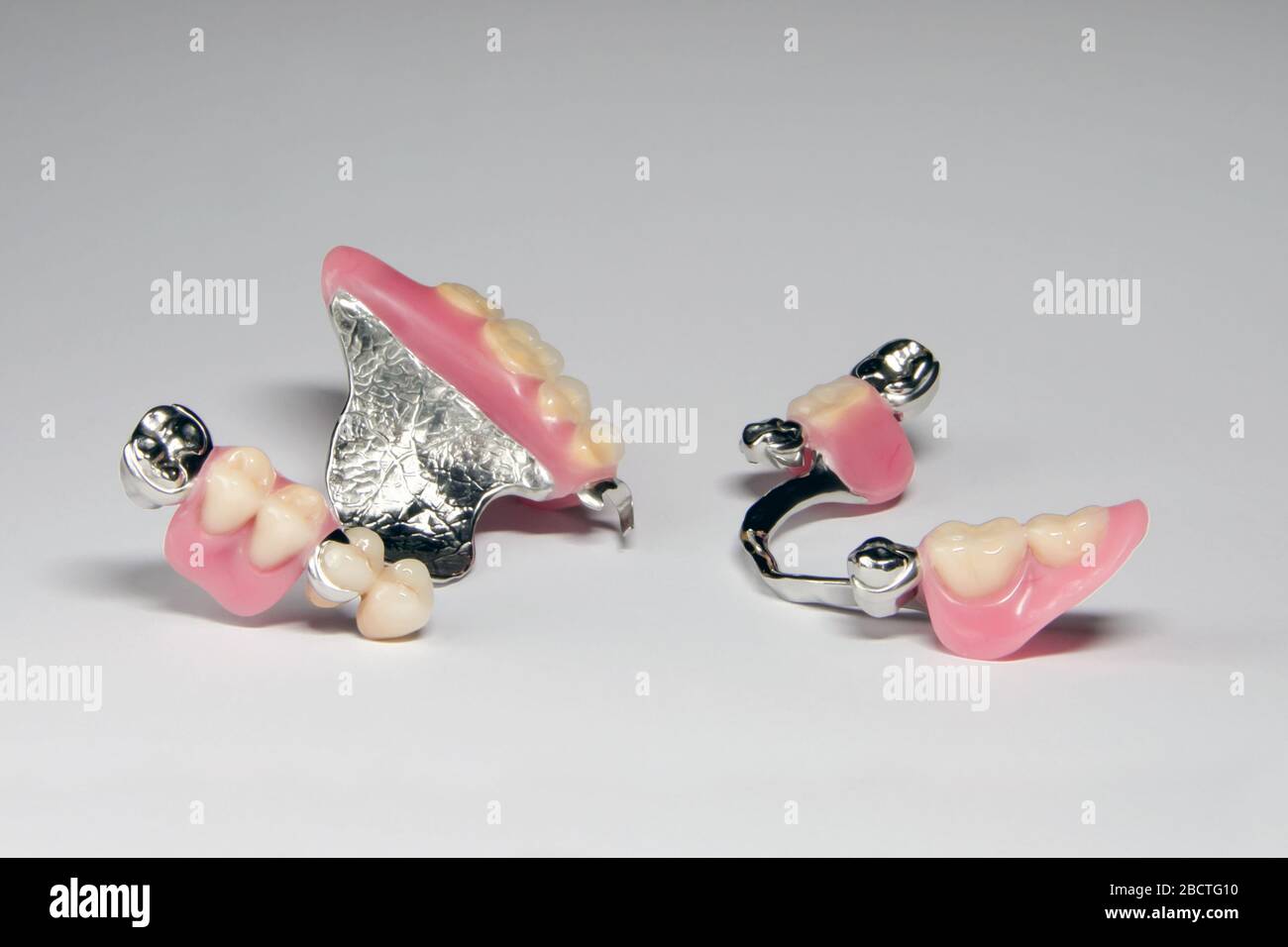 set of partial removable dentures of false teeth on the upper and lower
