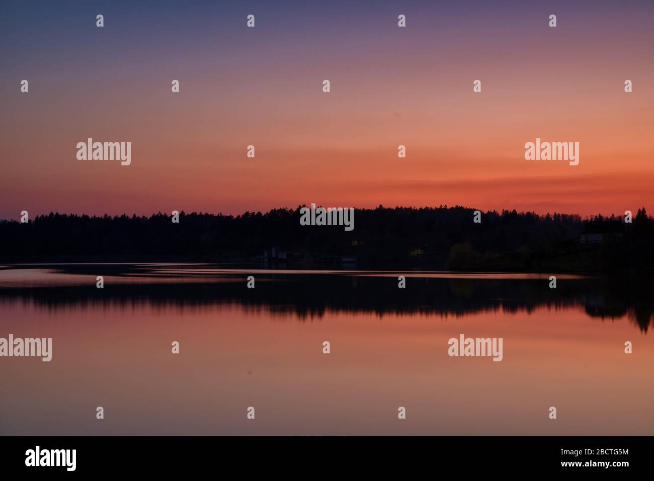 Sunset on Šmartinsko lake in covid 19 quarantine time Stock Photo