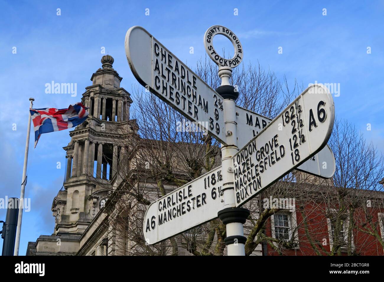 Stockport A6 fingerposts,County Borough, Cheadle,Chester,London,Buxton,Macclesfield,Carlisle,Manchester,Cheshire, England, UK Stock Photo