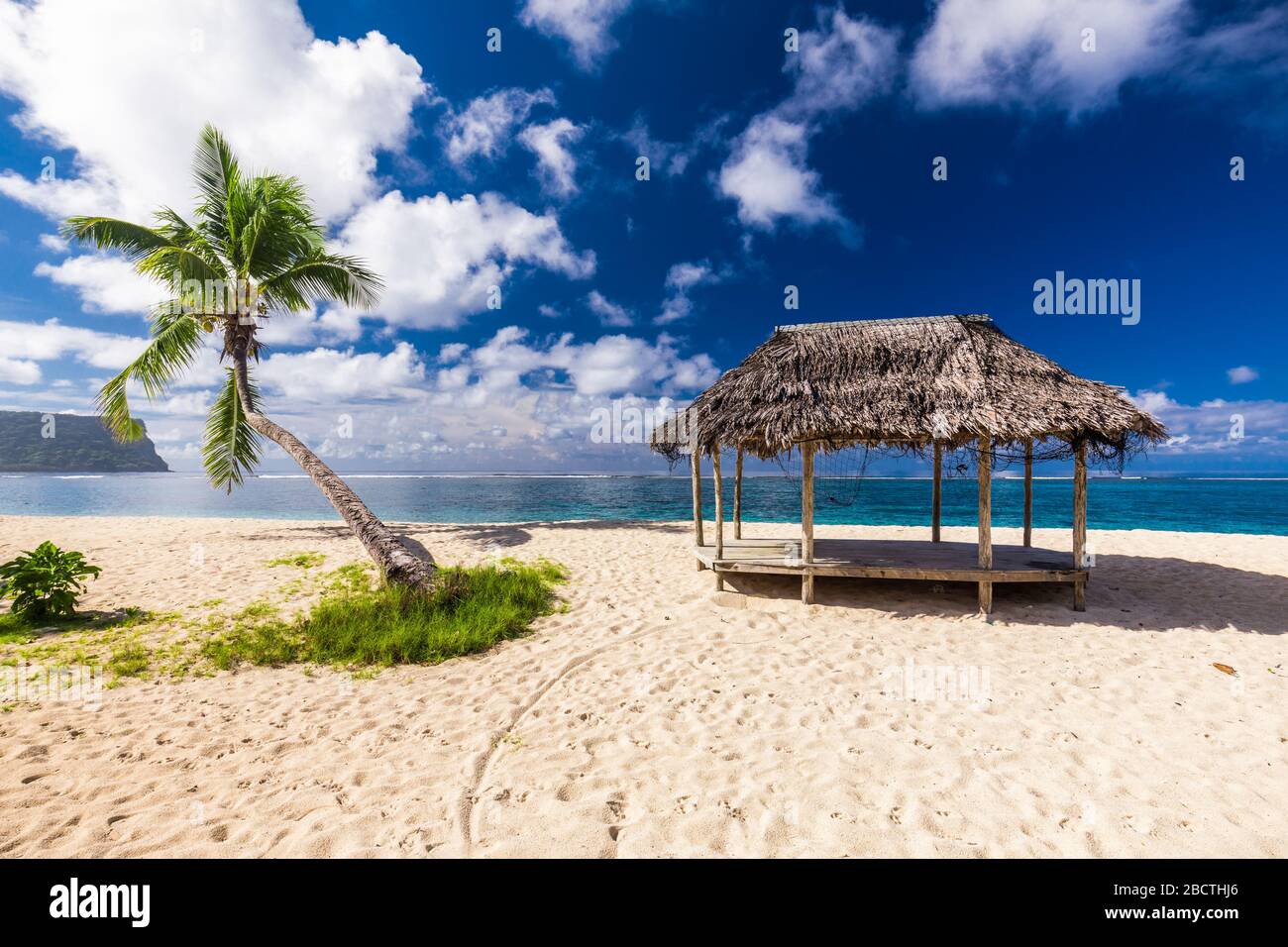 Lalomanu beach with open huts called fales, south side of Upolu Island