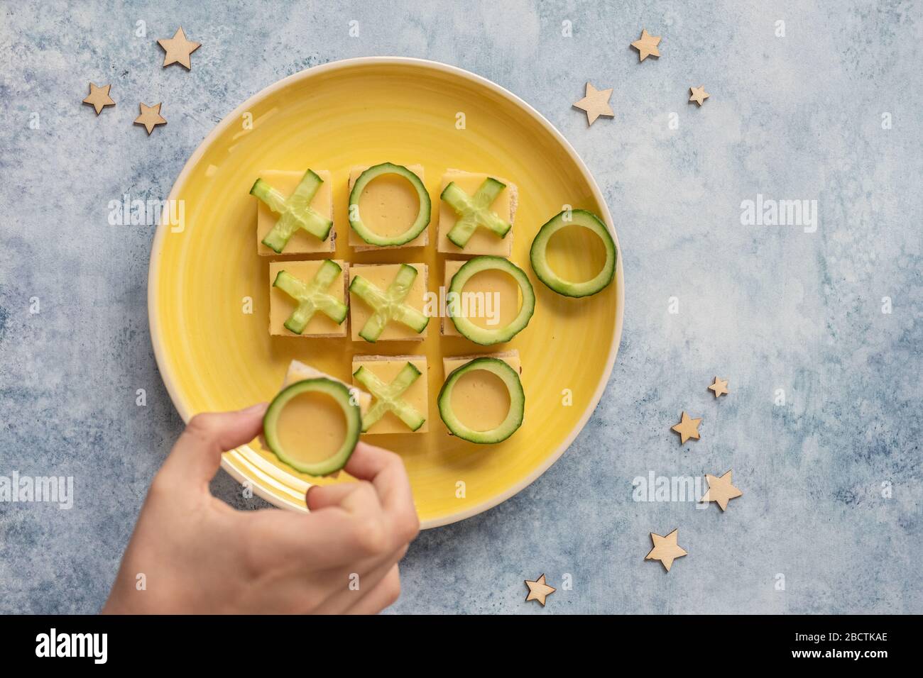 Tic tac toe sandwich. Fresh bread, cheese and cucumber Stock Photo Alamy