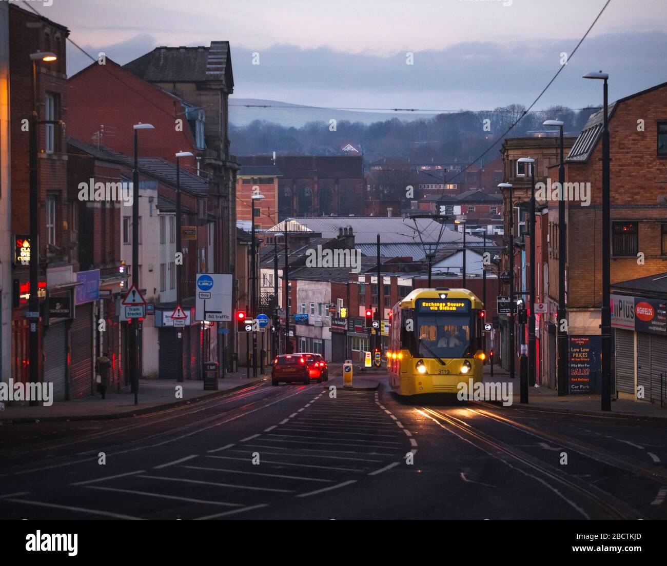 Manchester Metrolink Bombarder Flexity Swift M5000 tram climbing Drake street, Rochdale at dusk Stock Photo