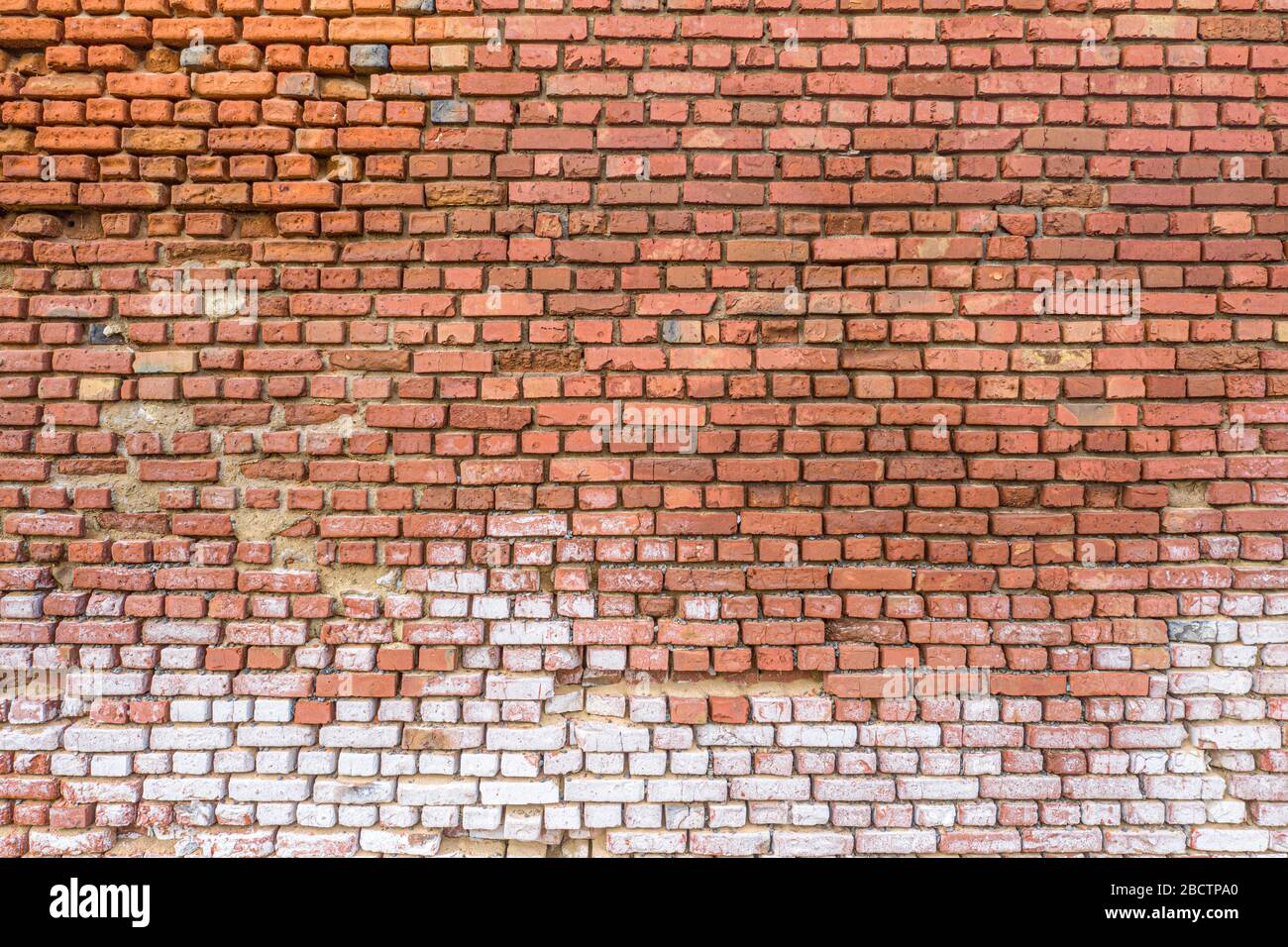 Red brick wall partially destroyed by rain. Texture Stock Photo - Alamy