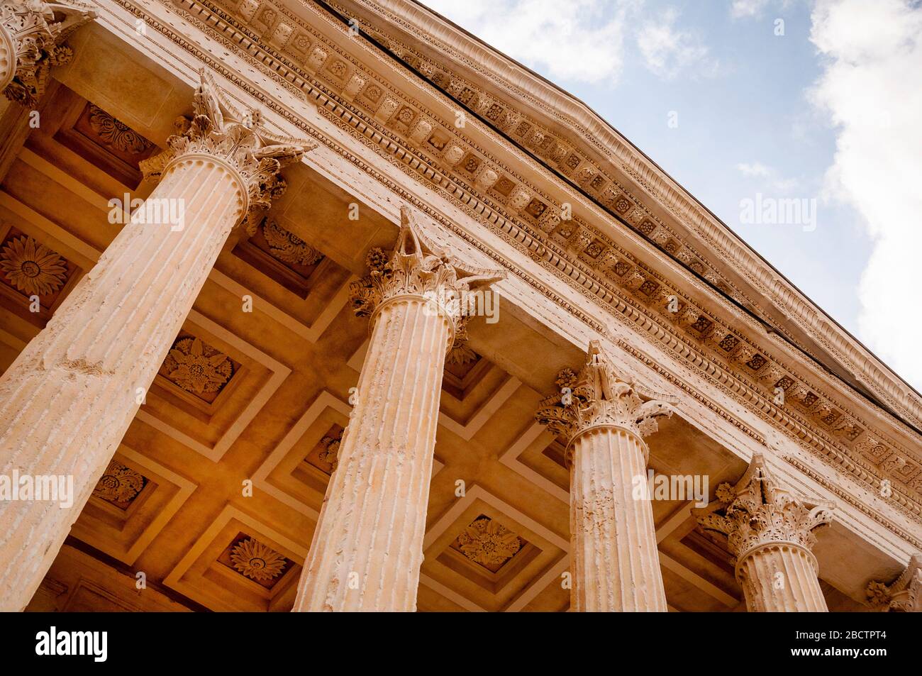 The Maison-Carrée in Nîmes France is an outstanding Roman temple and monument built in the Corinthain order of classical architecture. Stock Photo