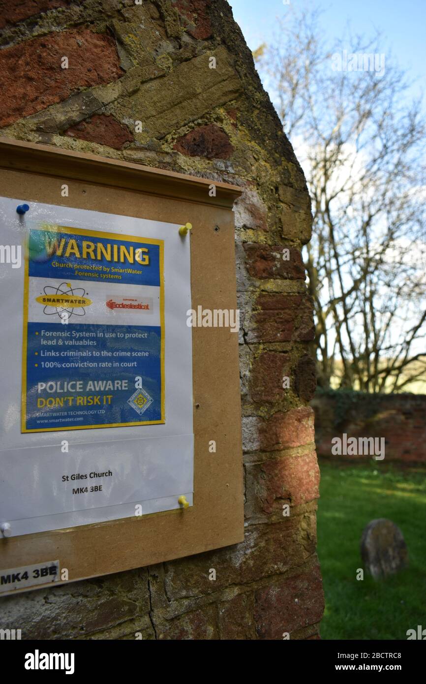 Warning notice at St Giles' Church in Milton Keynes. Stock Photo