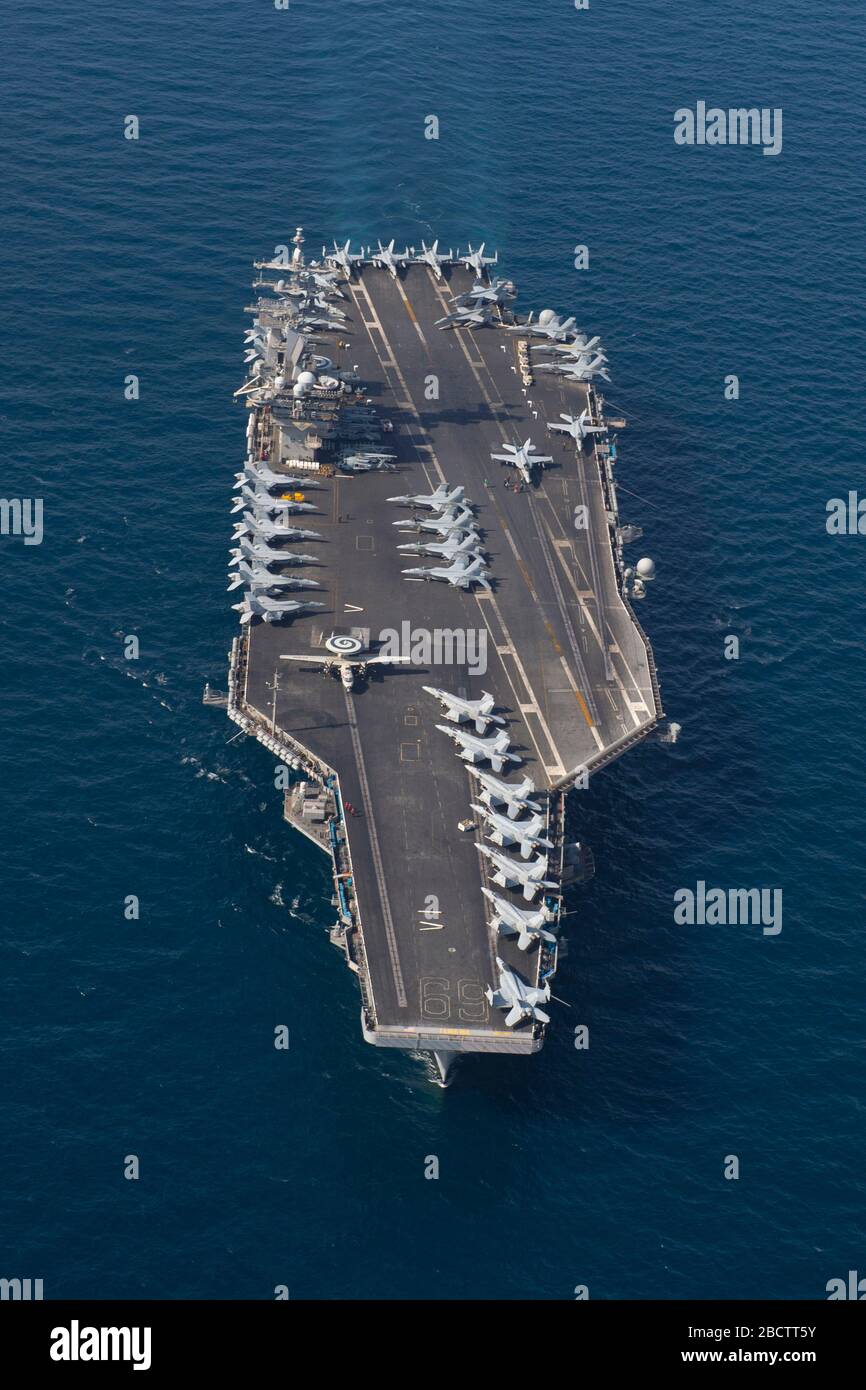 The U.S. Navy Nimitz-class aircraft carrier USS Dwight D. Eisenhower during transit April 2, 2020 in the Arabian Sea. Stock Photo