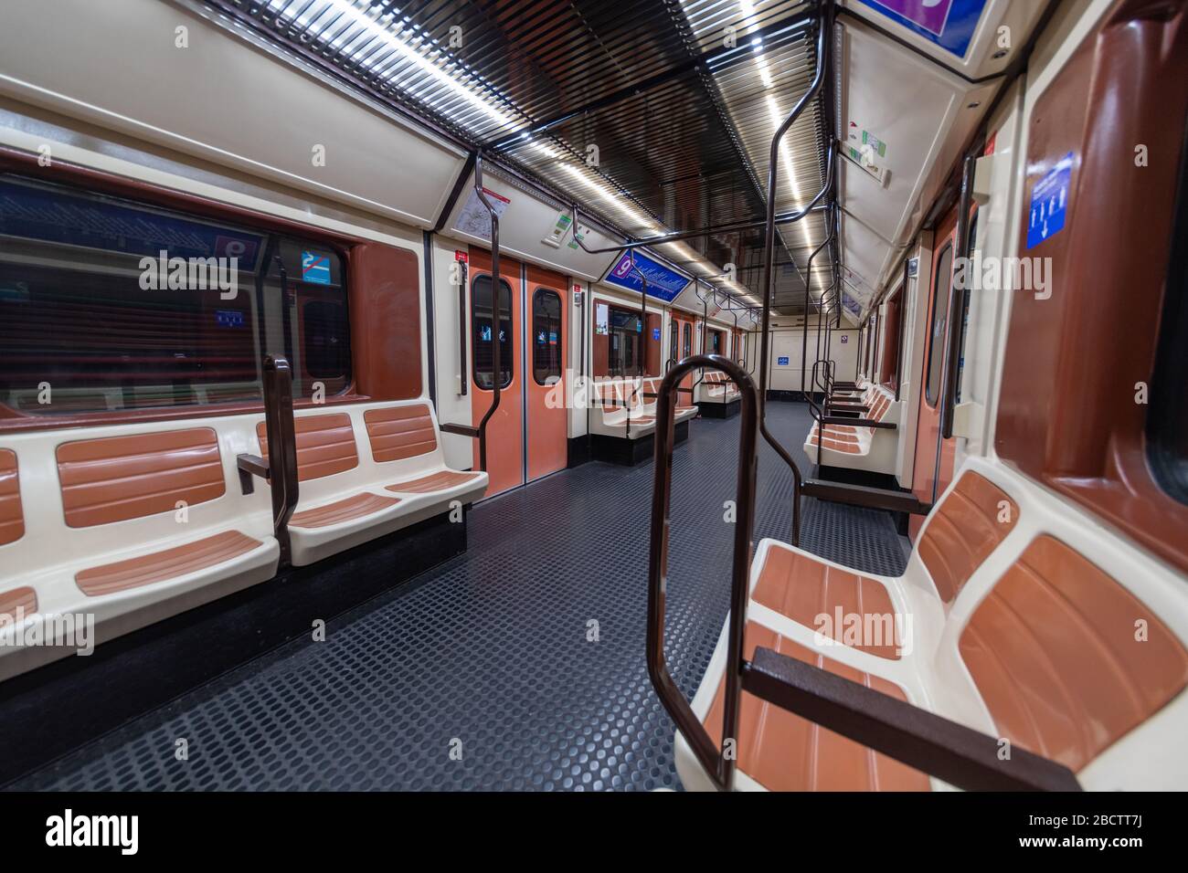 MADRID, SPAIN - APRIL 13, 2019: Inside empty Metro wagons on Line 9, an unusual sight for this type of transport. The Metro of Madrid is usually much Stock Photo