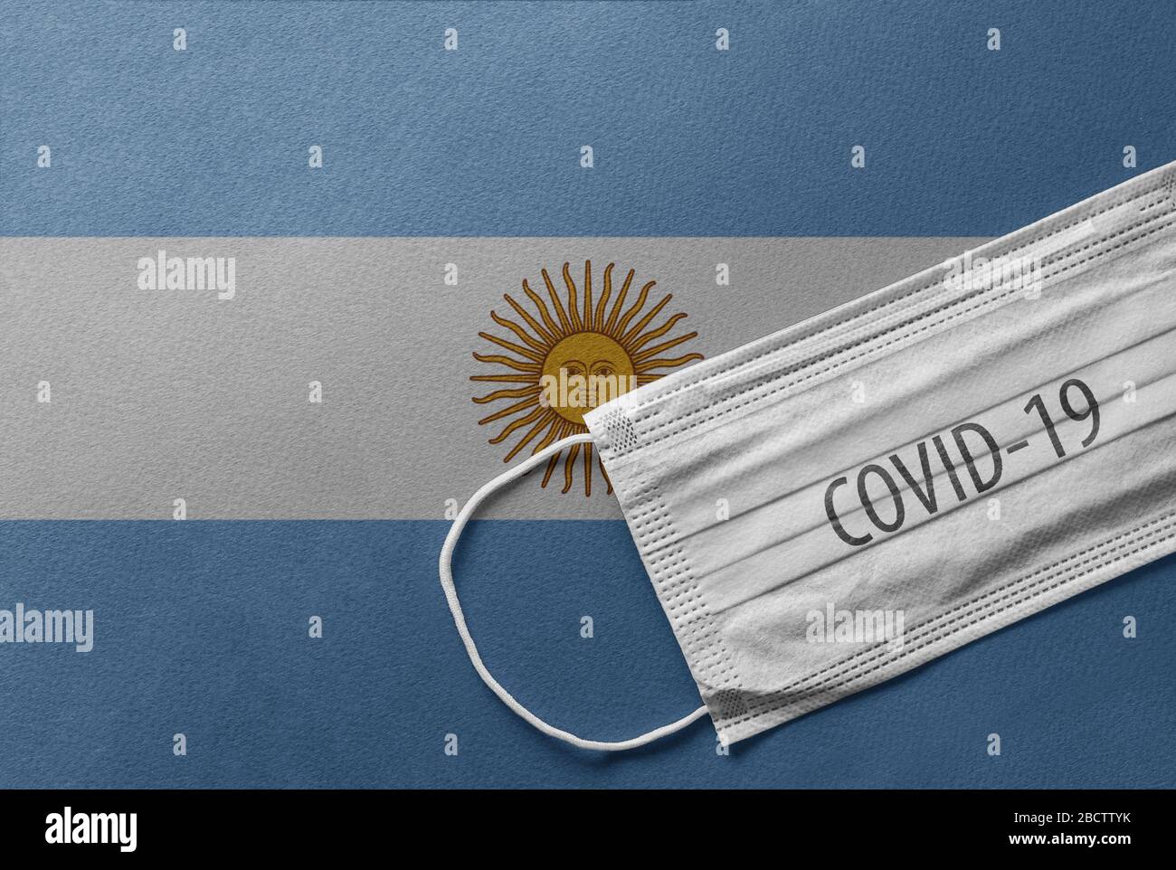 An individual face medical surgical mask on Argentina National Flag ...