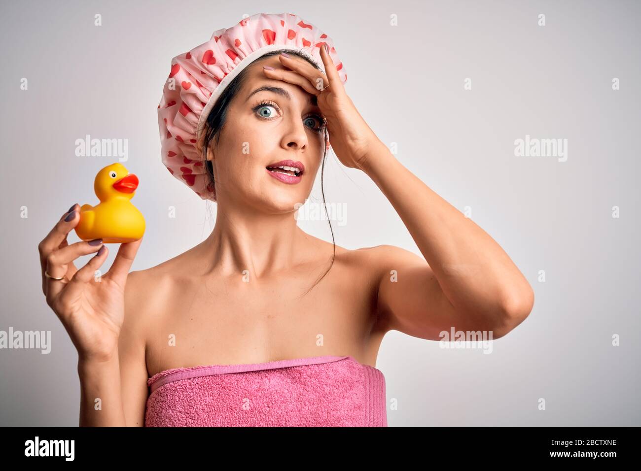shower cap holding duck toy 