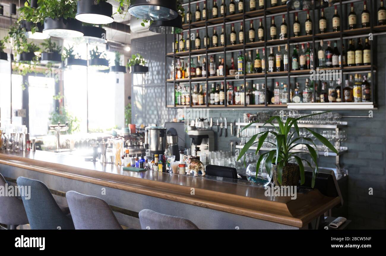 Interior of a modern urban restaurant with bar counter Stock Photo Alamy