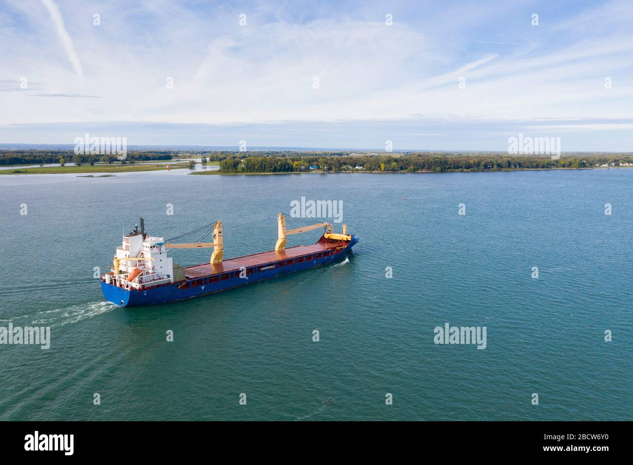 Cargo ship near the Port of Montreal on the St-Lawrence River Stock Photo